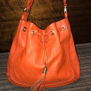 Orange leather Cole Haan bag